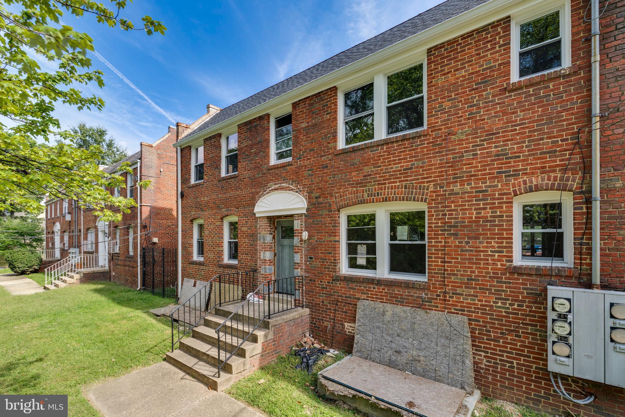2908 2nd Street Southeast Washington, DC 20032 - Photo 2 of 28 a front view of a house with garden