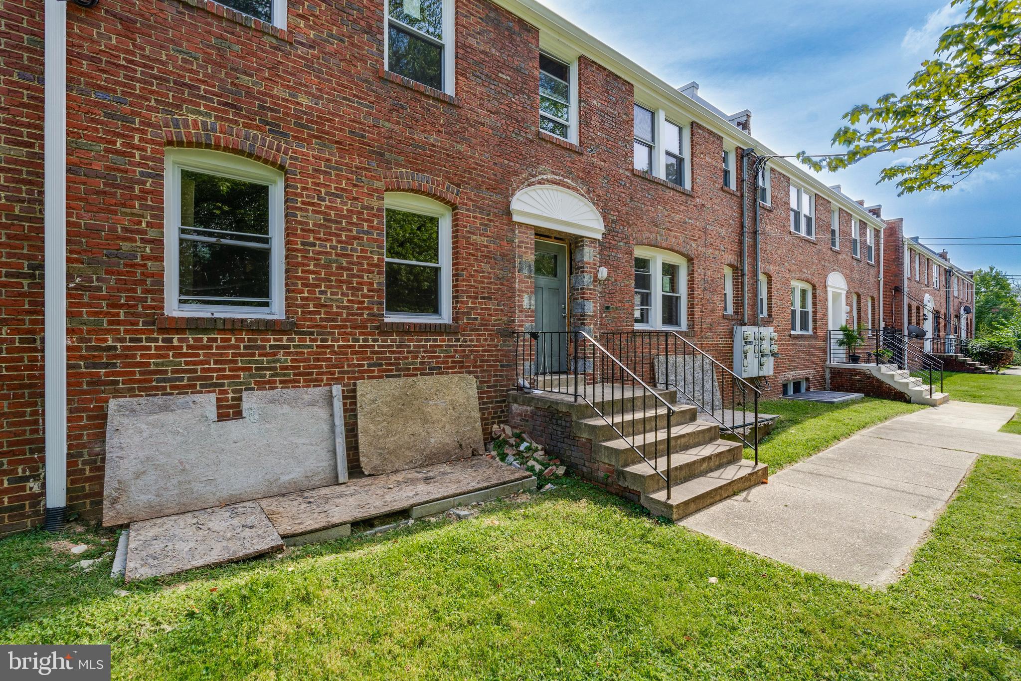 2908 2nd Street Southeast Washington, DC 20032 - Photo 3 of 28 a view of a house with a yard