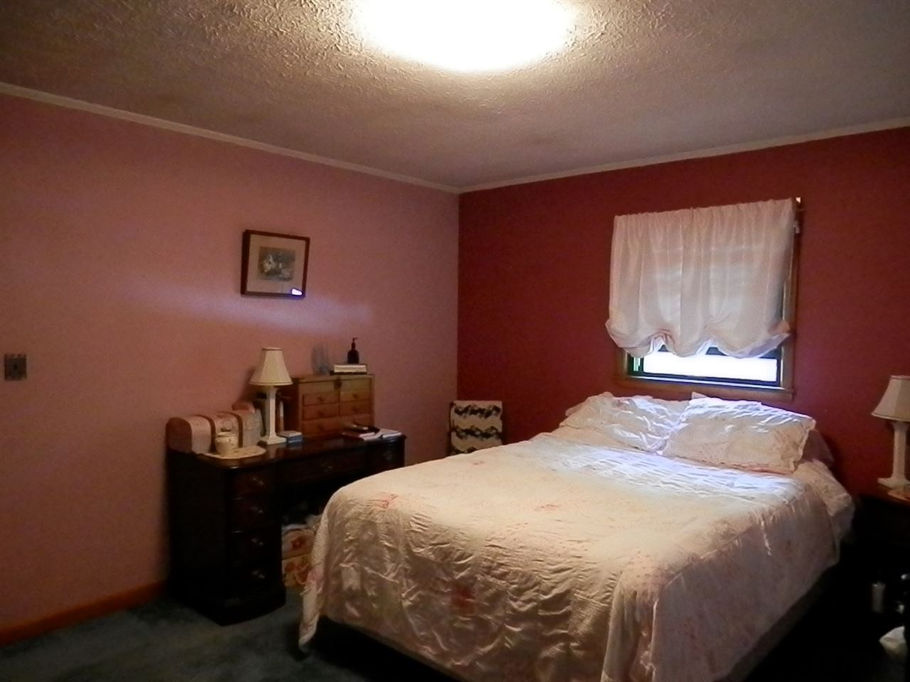 1595 Mt Torrey Road Lyndhurst, VA 22952 - Photo 17 of 29 a bedroom with a bed and a lamp with window