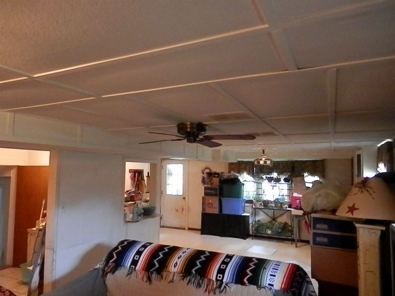 1595 Mt Torrey Road Lyndhurst, VA 22952 - Photo 21 of 29 a living room with lots of furniture and chandelier