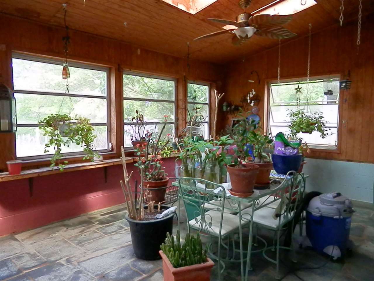 1595 Mt Torrey Road Lyndhurst, VA 22952 - Photo 24 of 29 a living room with furniture and a potted plant