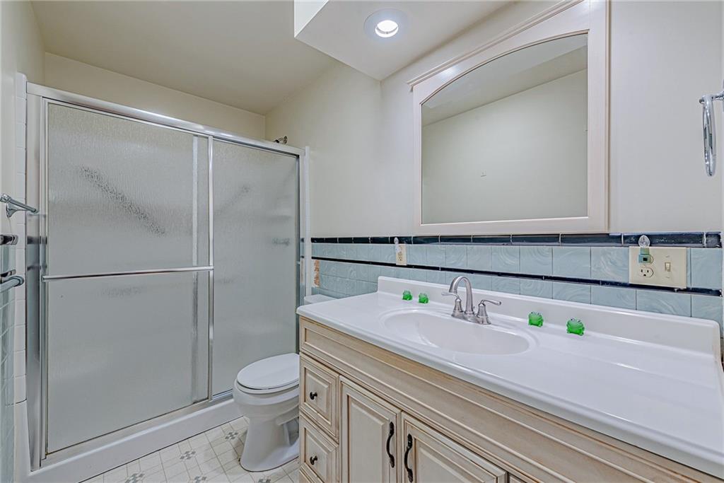 735 Highway 56 Apollo, PA 15613 - Photo 12 of 20 a bathroom with a sink a toilet and shower