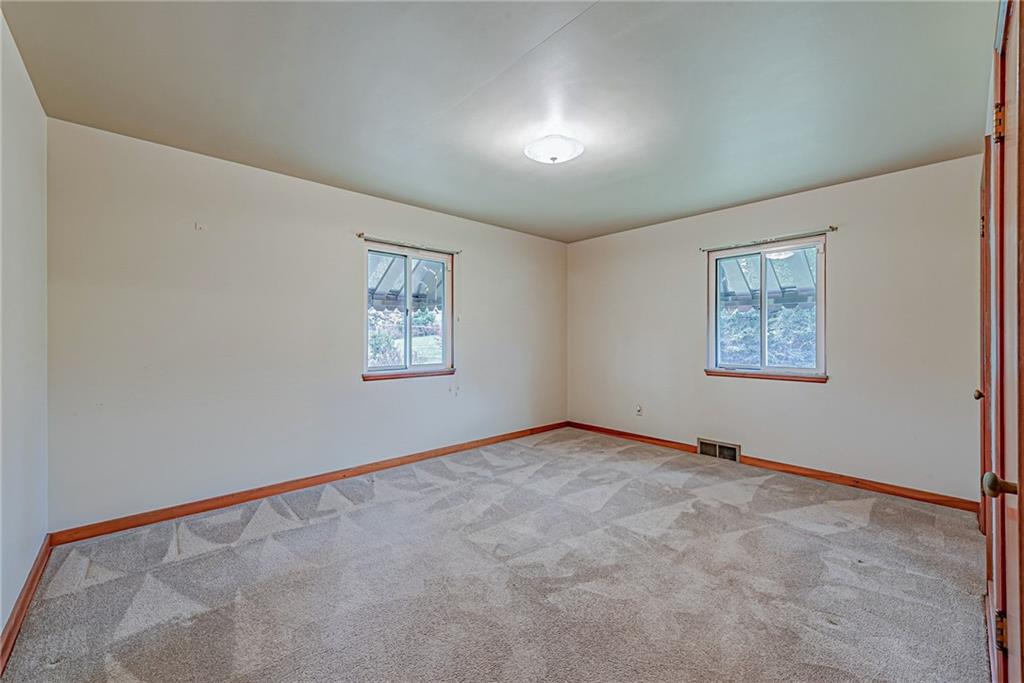 735 Highway 56 Apollo, PA 15613 - Photo 10 of 20 an empty room with windows and closet
