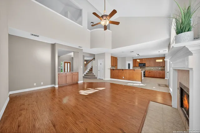 a view of kitchen and dining room with wooden floor