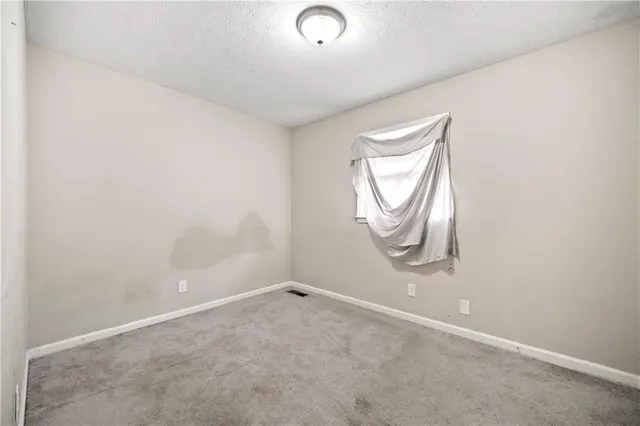 an empty room with a door