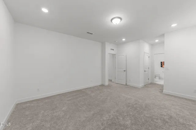 an empty room with an entryway