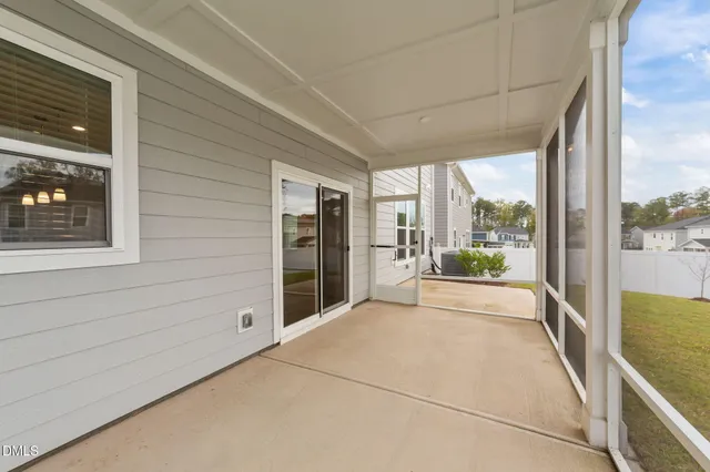 a view of storage and utility room with wooden floor