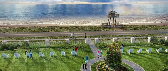 a view of multiple houses with a yard