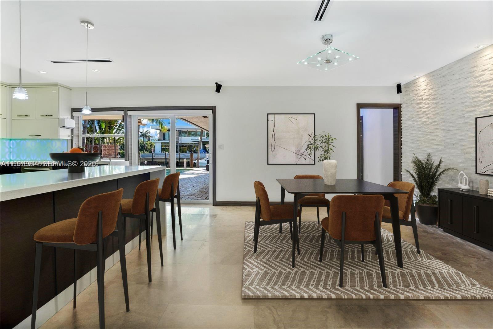 2130 Northeast 122nd Road North Miami, FL 33181 - Photo 2 of 86 a view of a dining room with furniture