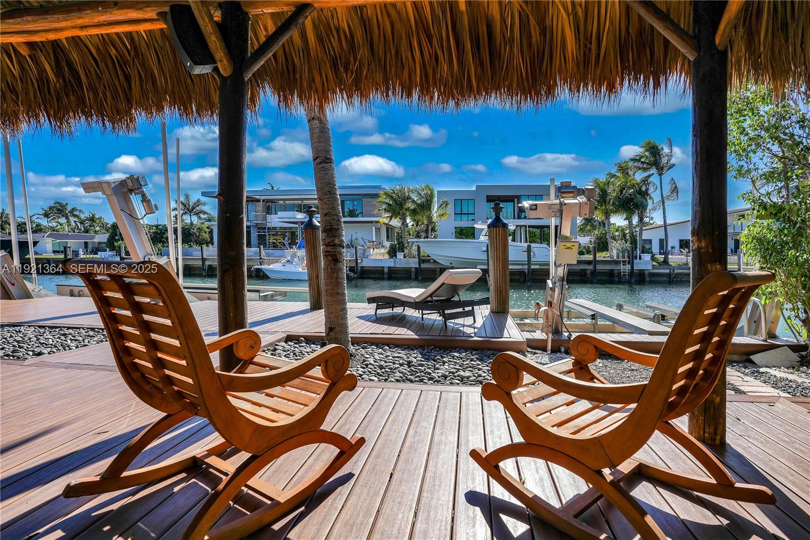 2130 Northeast 122nd Road North Miami, FL 33181 - Photo 24 of 86 a view of a chairs and table in patio