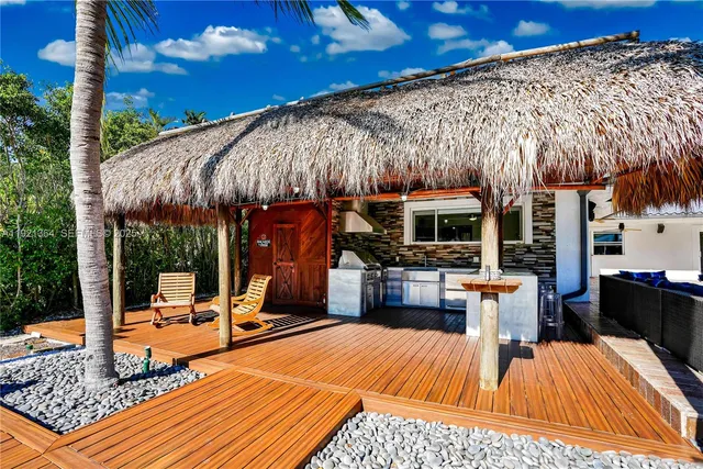 an aerial view of residential building with ocean view