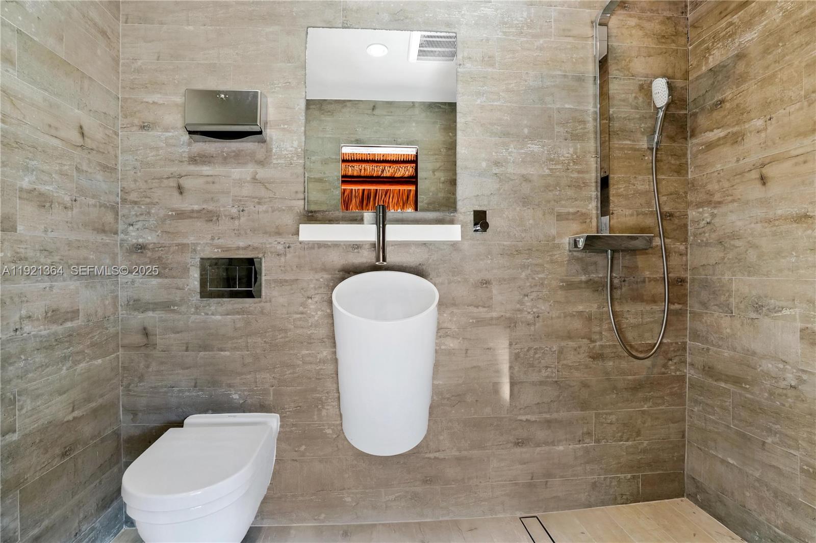 2130 Northeast 122nd Road North Miami, FL 33181 - Photo 31 of 86 a bathroom with a toilet