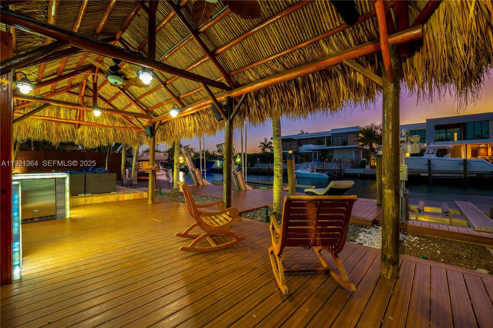 2130 Northeast 122nd Road North Miami, FL 33181 - Photo 33 of 86 a view of a swimming pool with a patio and a barbeque grill