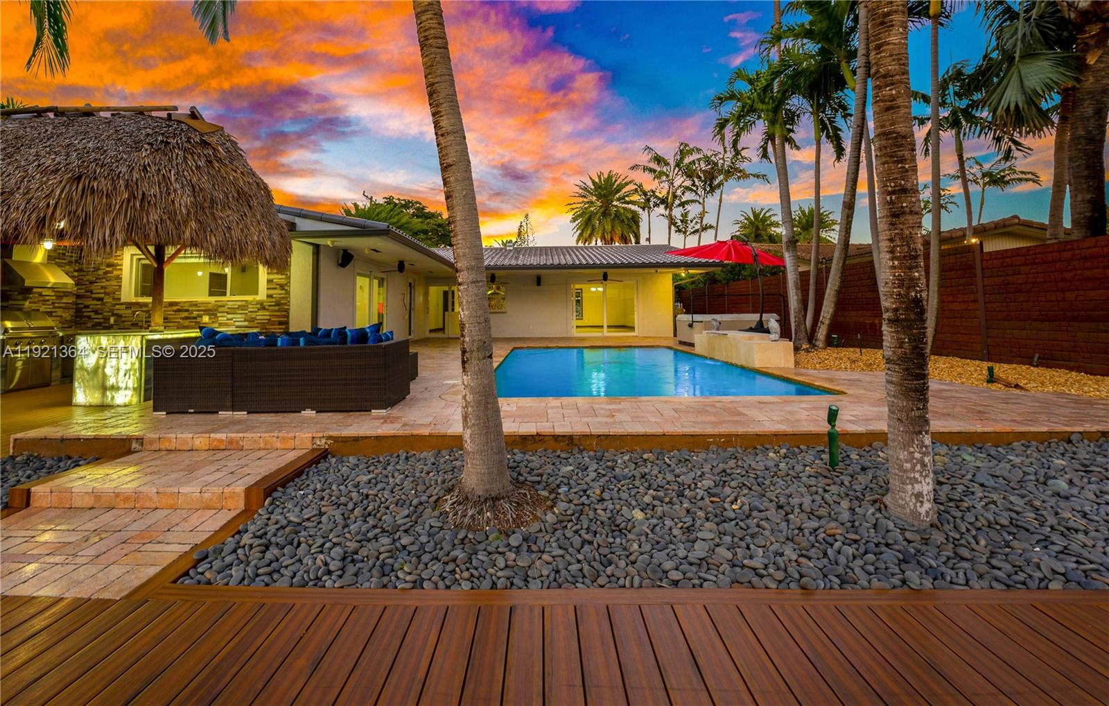 2130 Northeast 122nd Road North Miami, FL 33181 - Photo 36 of 86 a view of a house with a patio