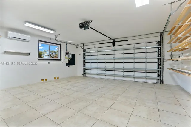 a view of a kitchen with a sink and cabinets