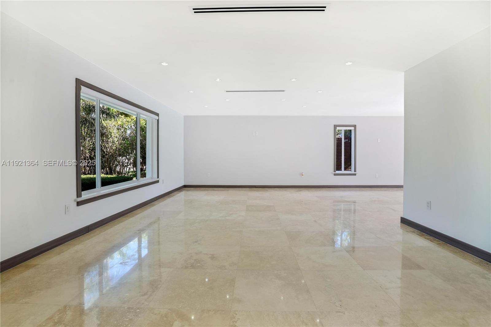 2130 Northeast 122nd Road North Miami, FL 33181 - Photo 82 of 86 a view of an empty room with a window