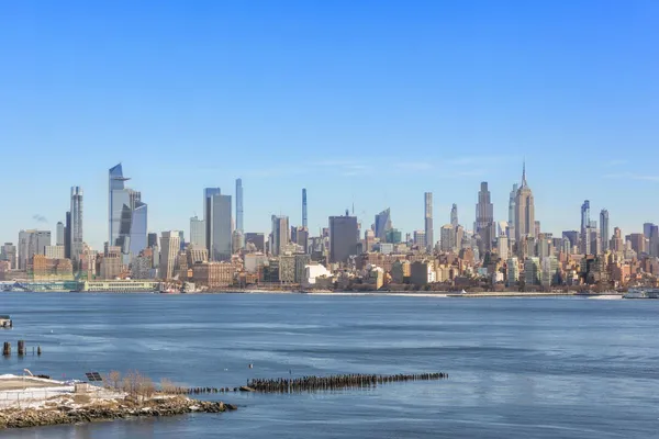 a view of a city with tall buildings