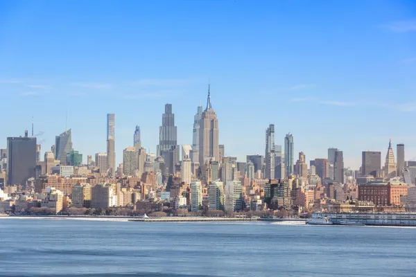 a view of a city with tall buildings