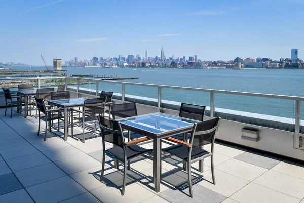 a view of a terrace with furniture