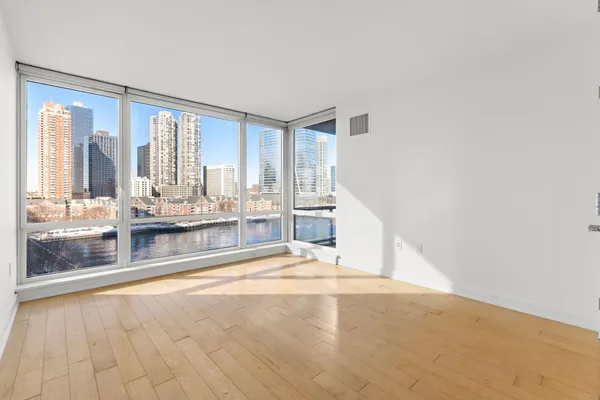 a view of an empty room and window