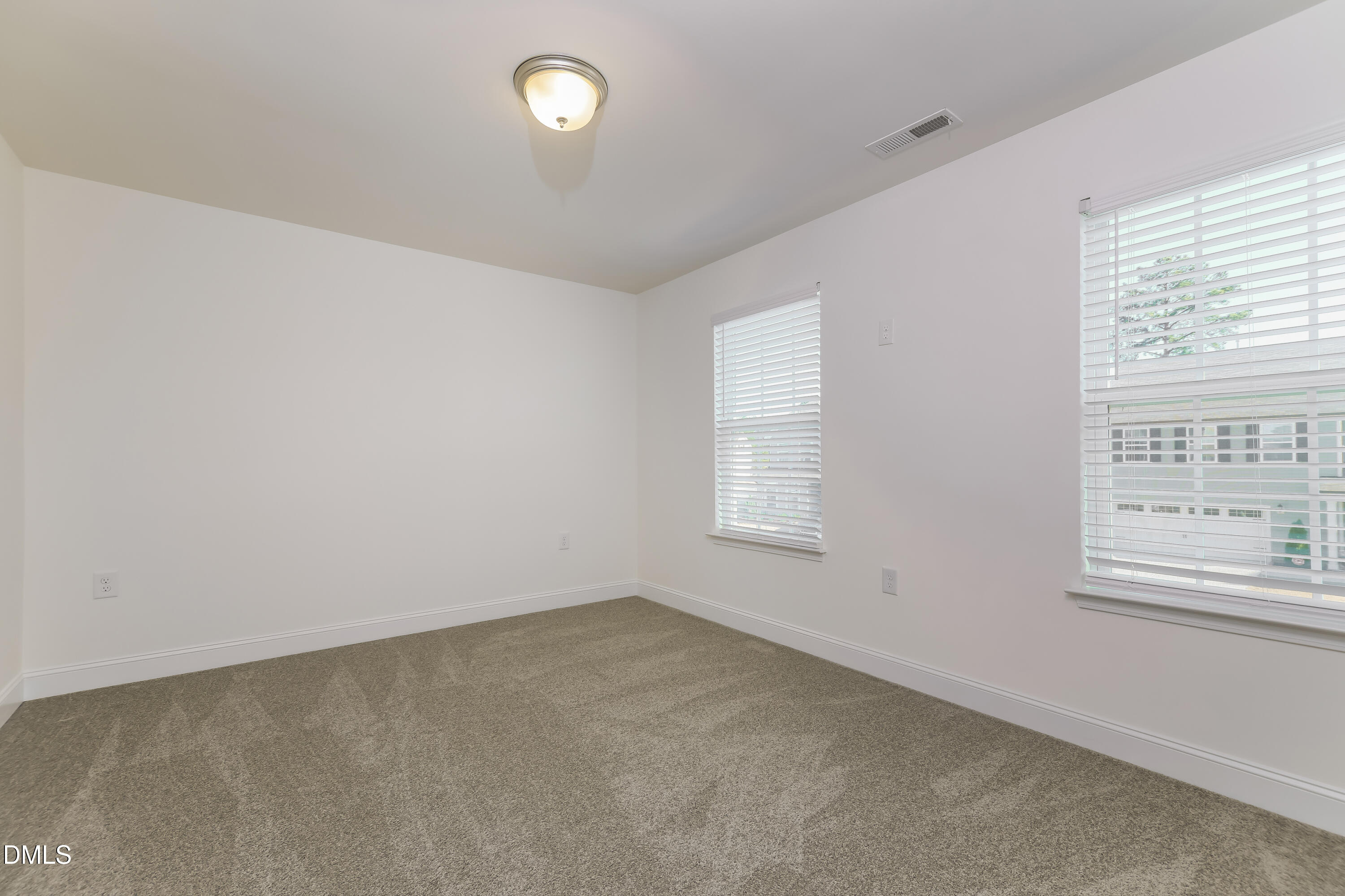 20 Misty Grove Trail Franklinton, NC 27525 - Photo 11 of 17 an empty room with windows