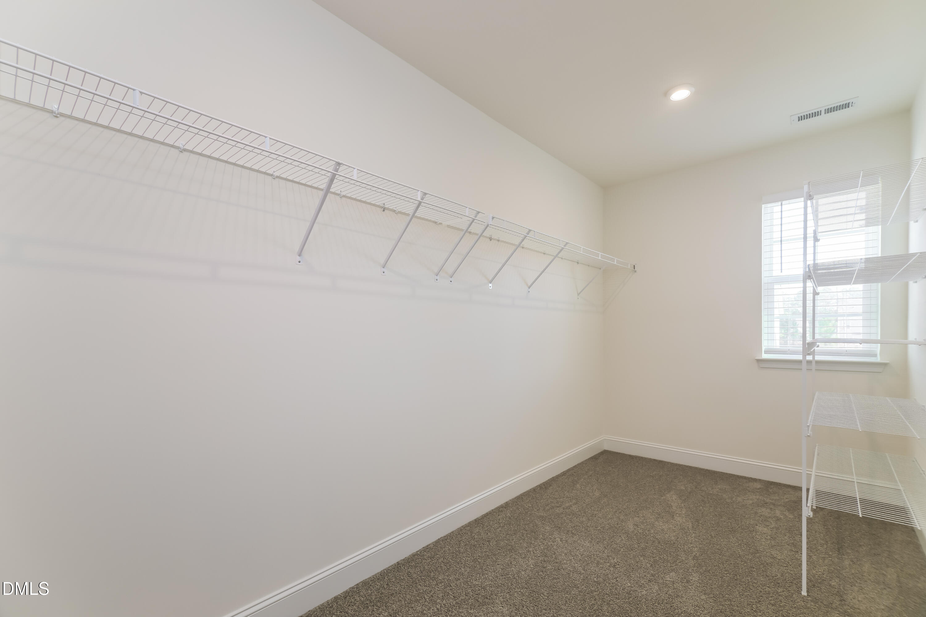 20 Misty Grove Trail Franklinton, NC 27525 - Photo 14 of 17 a room that has a window in it