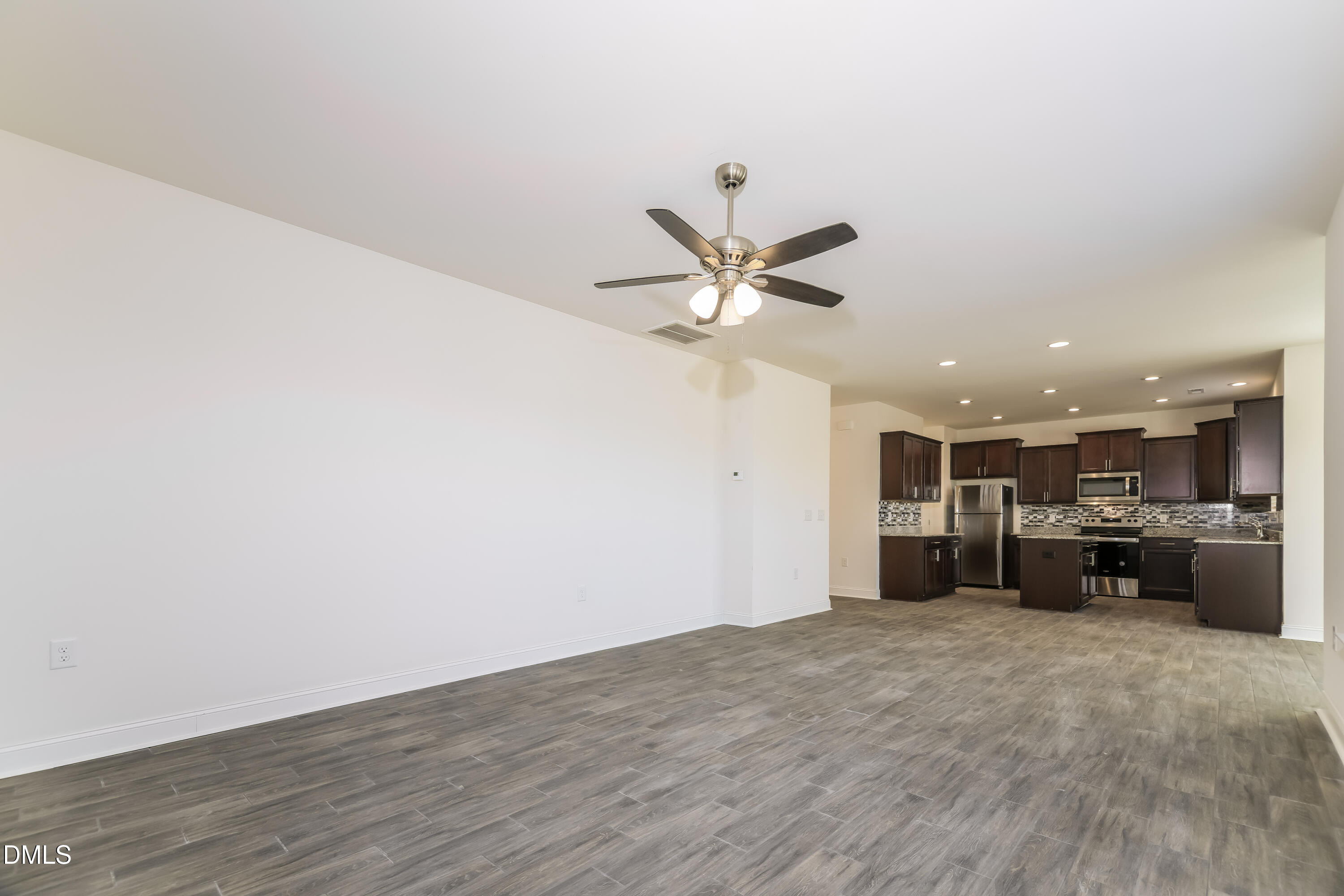 20 Misty Grove Trail Franklinton, NC 27525 - Photo 2 of 17 a view of a kitchen with a sink and a refrigerator