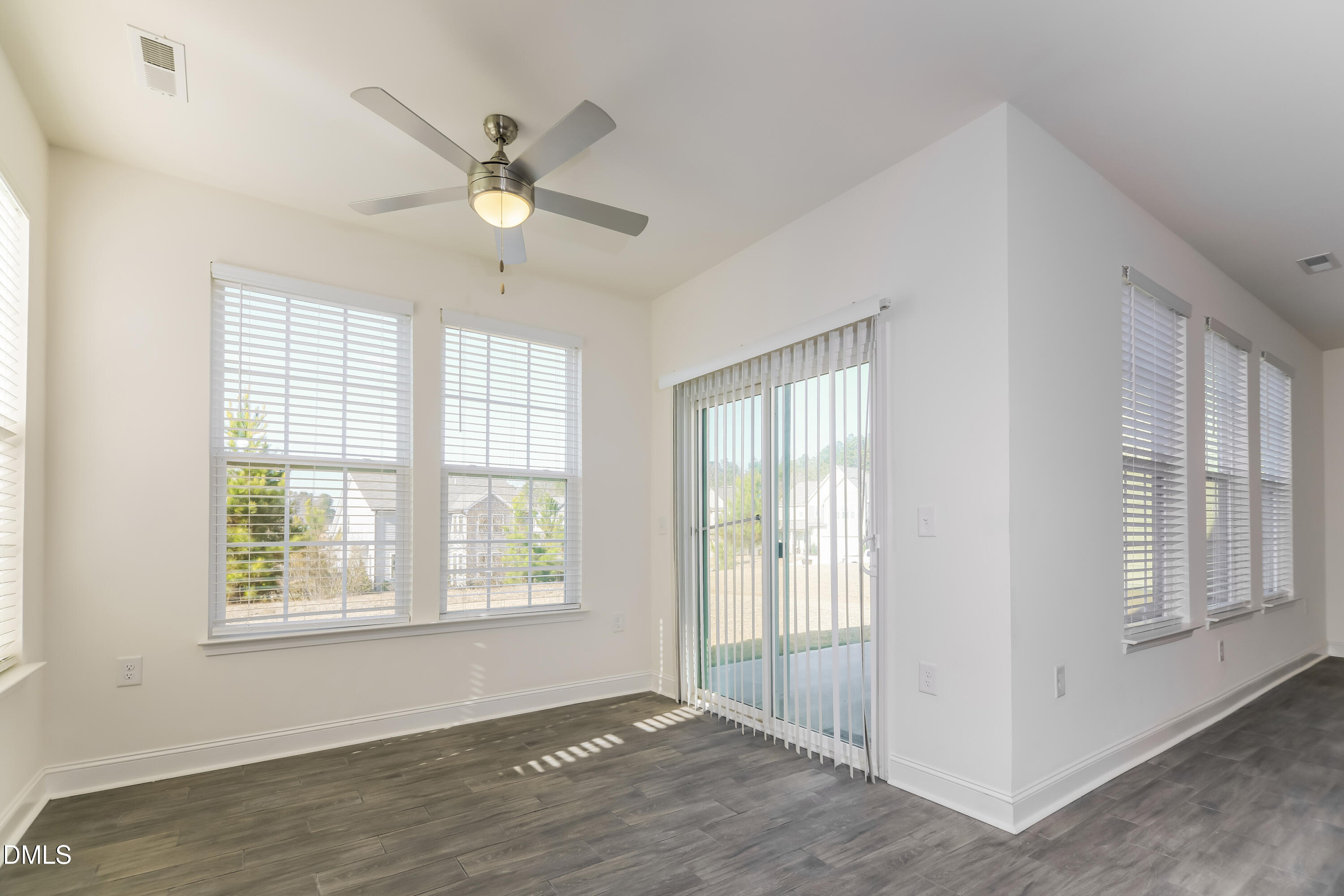 20 Misty Grove Trail Franklinton, NC 27525 - Photo 5 of 17 a view of an empty room with a window