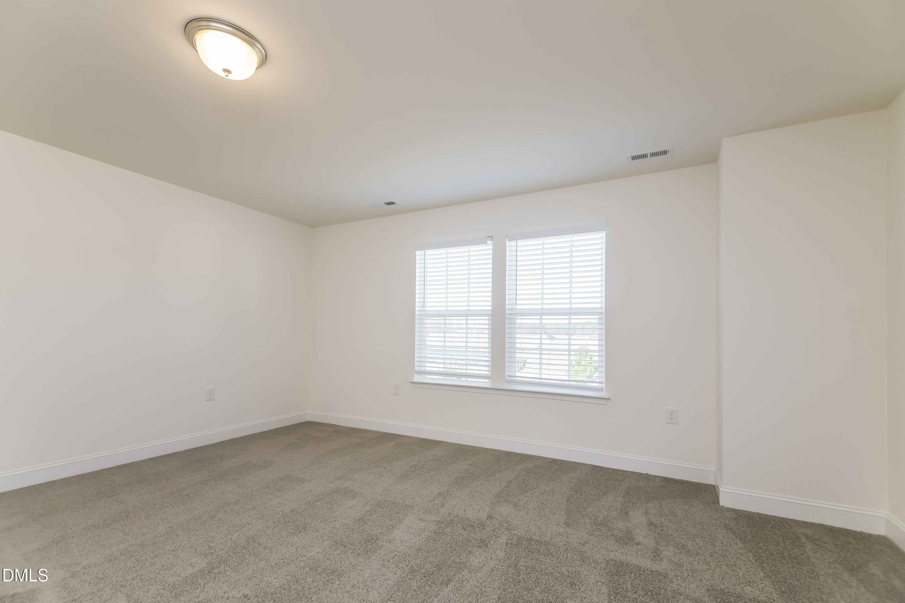 20 Misty Grove Trail Franklinton, NC 27525 - Photo 7 of 17 an empty room with a window
