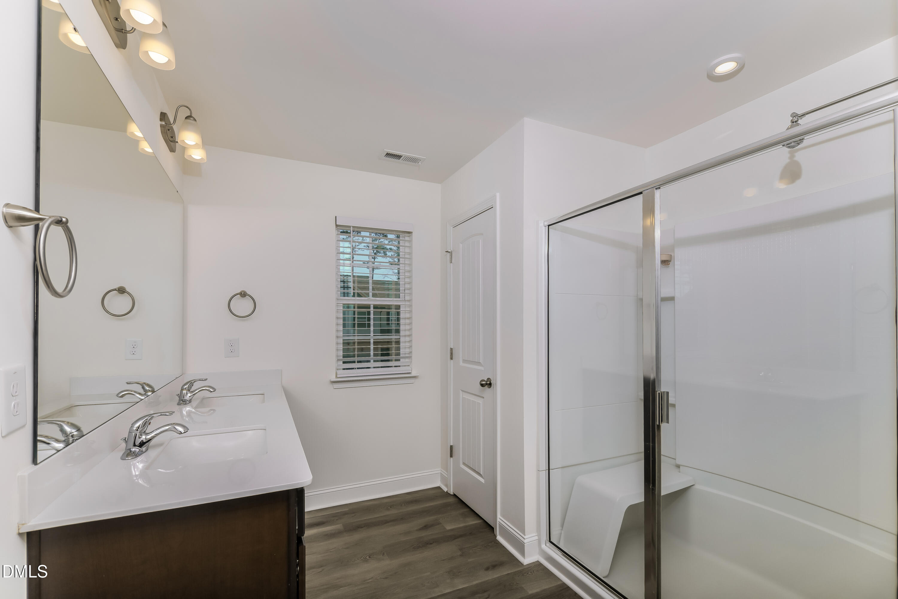 20 Misty Grove Trail Franklinton, NC 27525 - Photo 9 of 17 a bathroom with a sink shower and a mirror