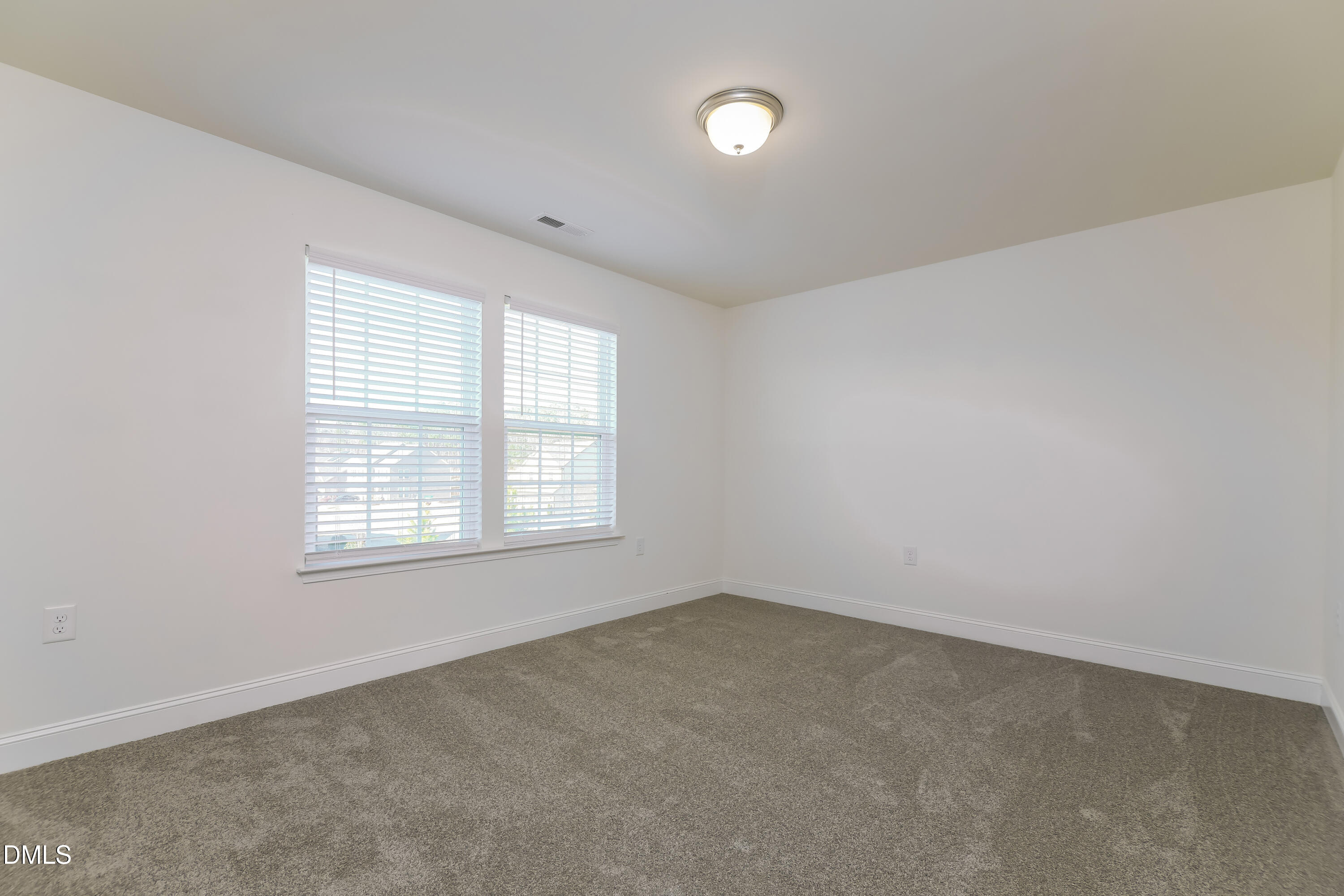 20 Misty Grove Trail Franklinton, NC 27525 - Photo 10 of 17 an empty room with a window