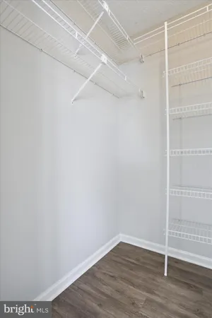 a view of an empty walk in closet