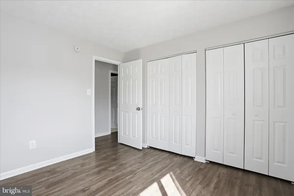 a view of a livingroom with wooden floor