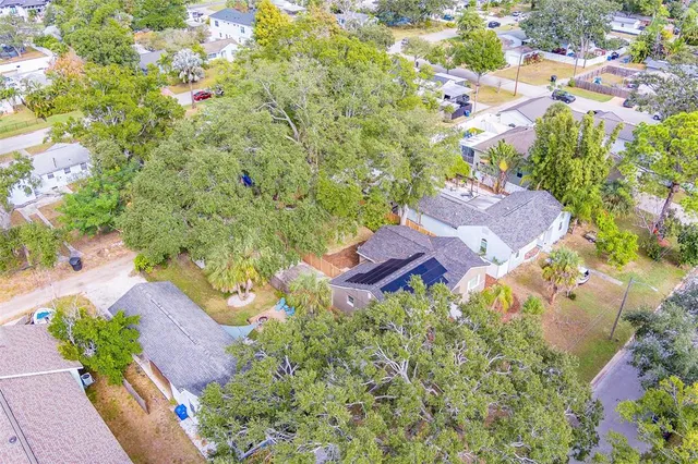 an aerial view of a houses with outdoor space and street view