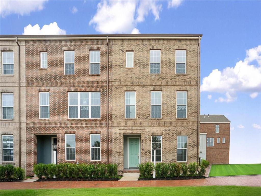 212 Oliver Way Cranberry Township, PA 16066 - Photo 1 of 49 a front view of a brick building with yard