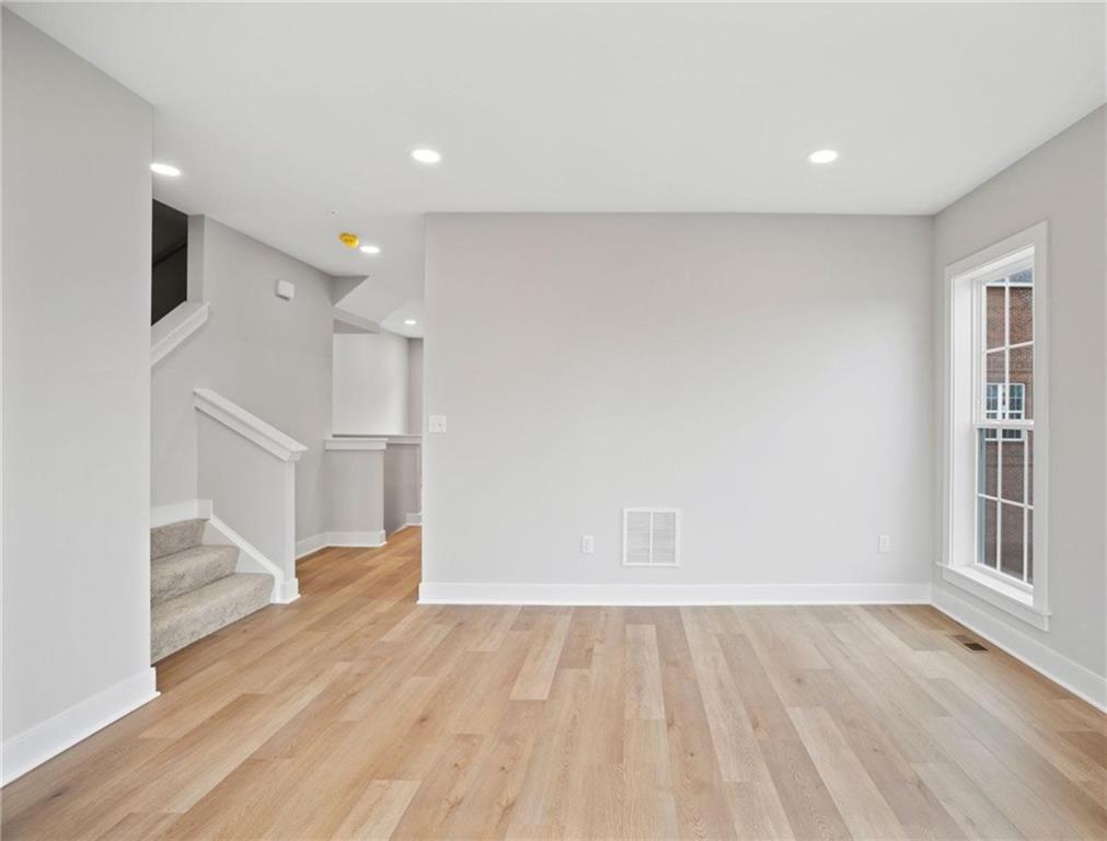 212 Oliver Way Cranberry Township, PA 16066 - Photo 17 of 49 wooden floor in an empty room with a window