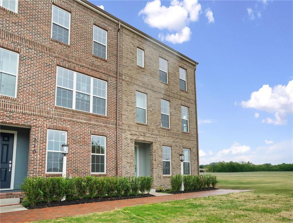 212 Oliver Way Cranberry Township, PA 16066 - Photo 33 of 49 a front view of a building with garden