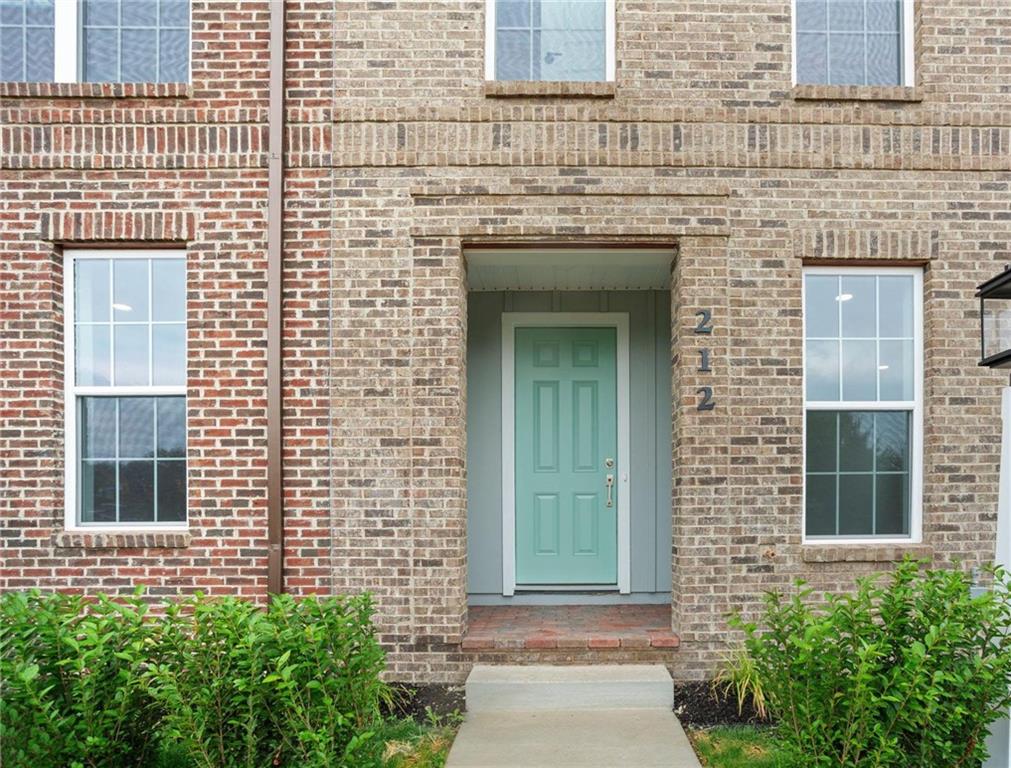 212 Oliver Way Cranberry Township, PA 16066 - Photo 34 of 49 a view of a brick house with a large windows