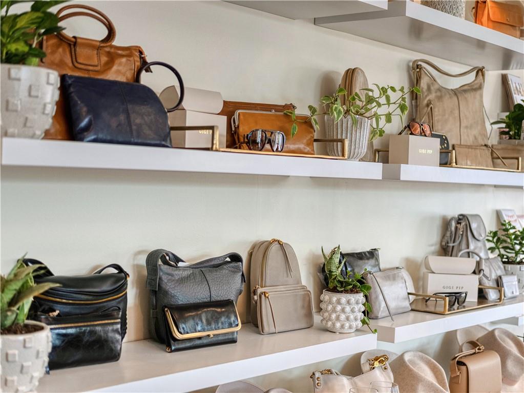 212 Oliver Way Cranberry Township, PA 16066 - Photo 40 of 49 a kitchen with a faucet a potted plant and cabinets