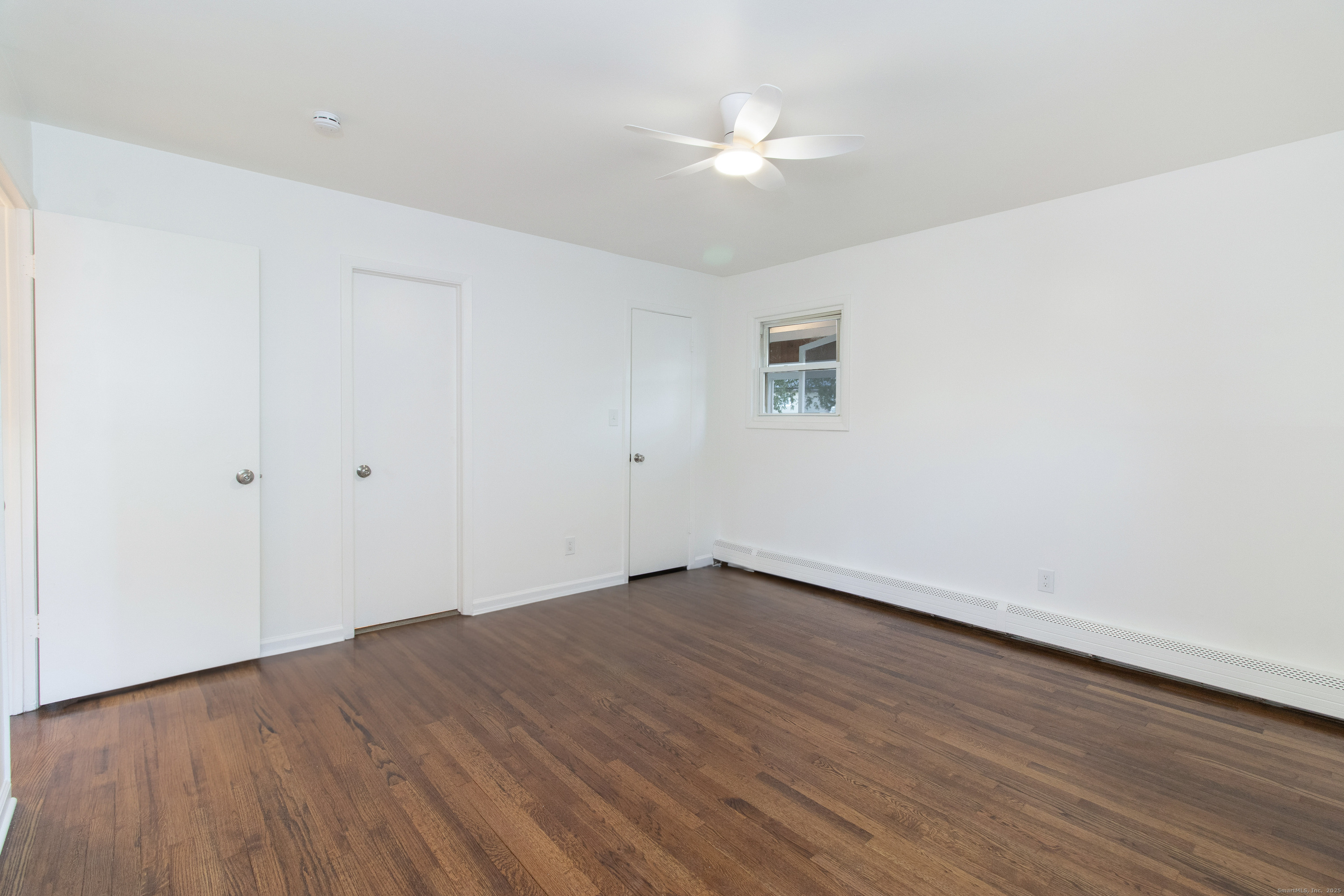 14 Windward Road Norwalk, CT 06854 - Photo 18 of 35 Primary bedroom complete with walk in closet and entrance to en suite primary bath.