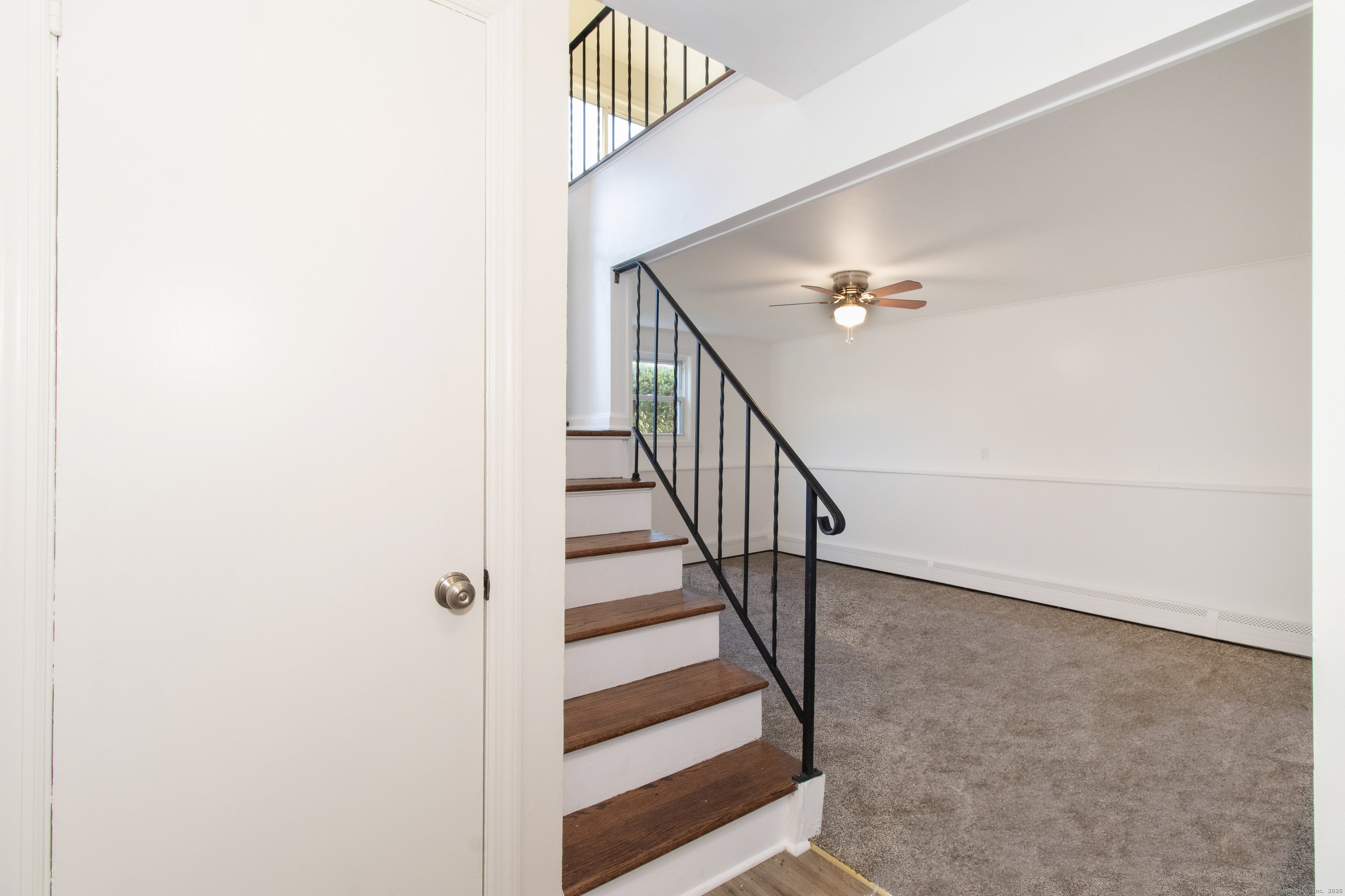 14 Windward Road Norwalk, CT 06854 - Photo 6 of 35 Entry way from garage, stairs to main floor and downstairs family room.