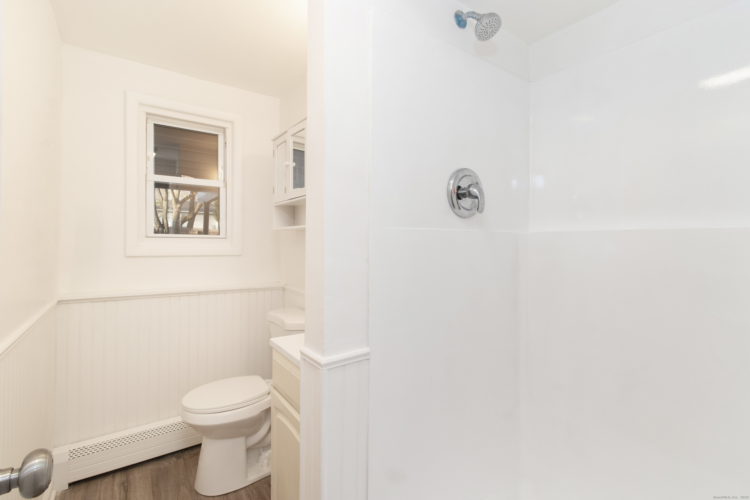 14 Windward Road Norwalk, CT 06854 - Photo 7 of 35 Downstairs full bathroom complete with new finishes.