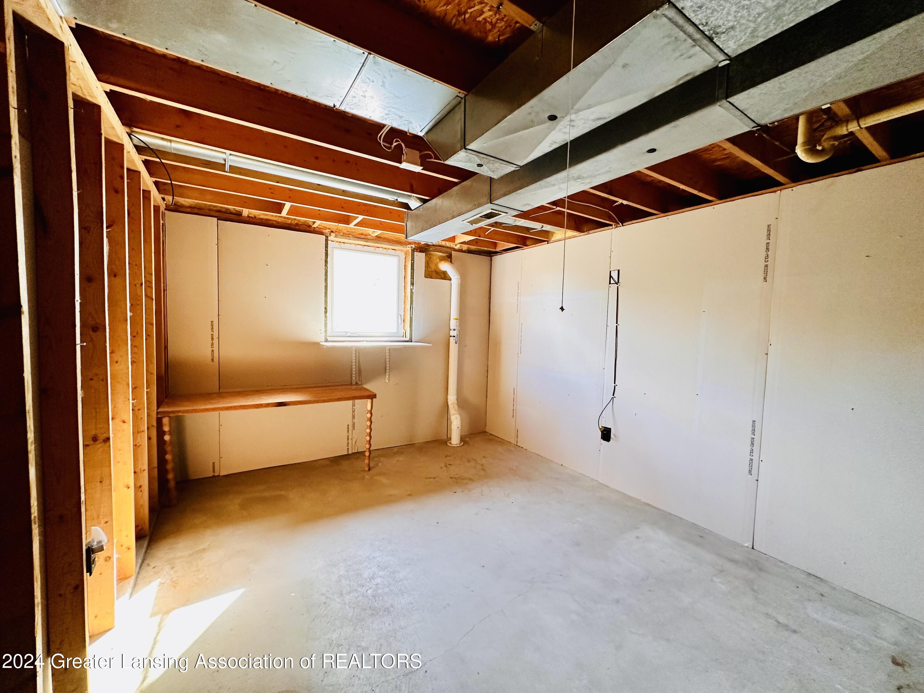 4865 Knapp Street Dimondale, MI 48821 - Photo 15 of 18 Egress window in lower level