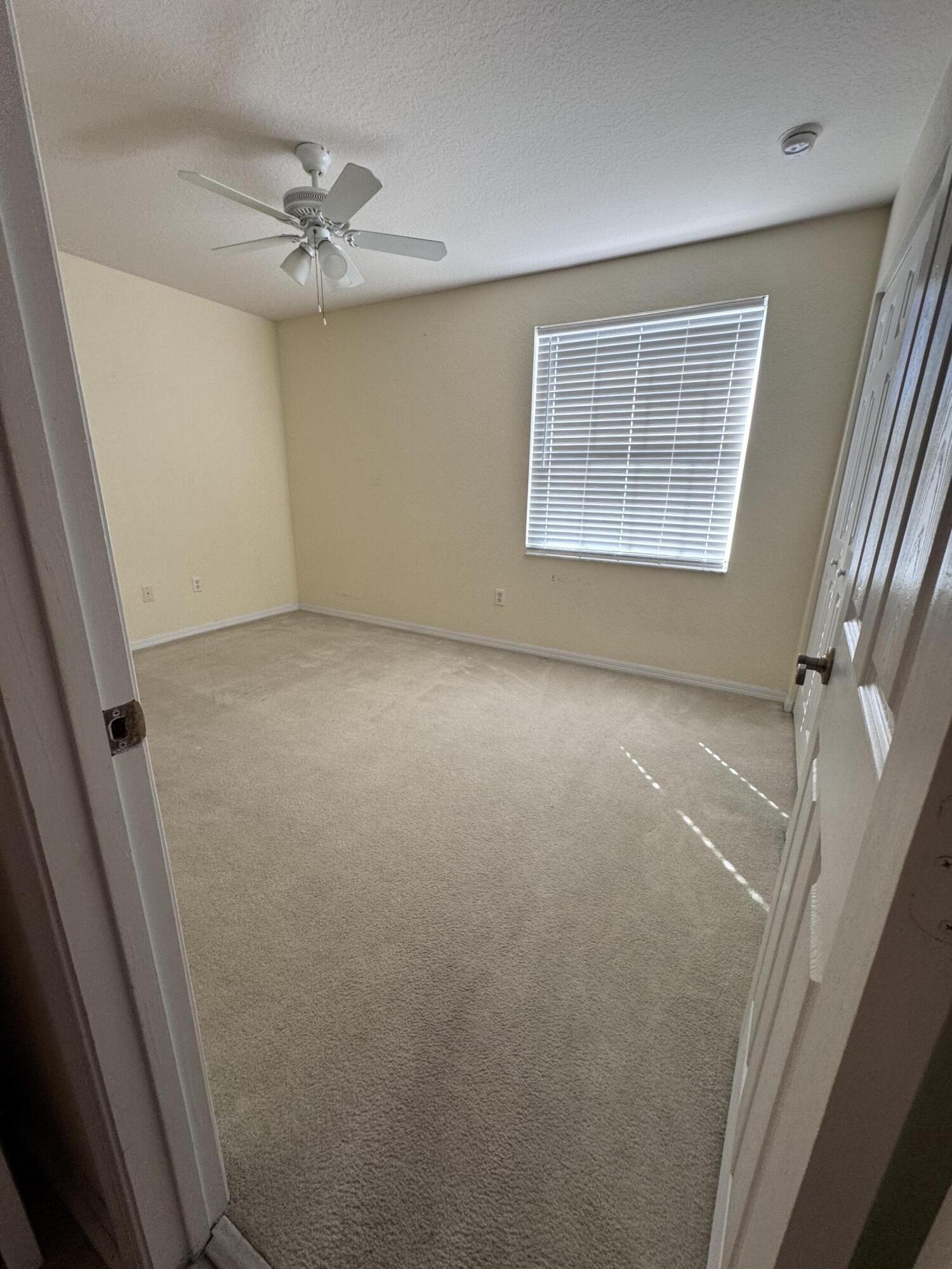 2755 Southeast Birmingham Drive, Unit 3 Stuart, FL 34994 - Photo 18 of 23 a view of an empty room with a window