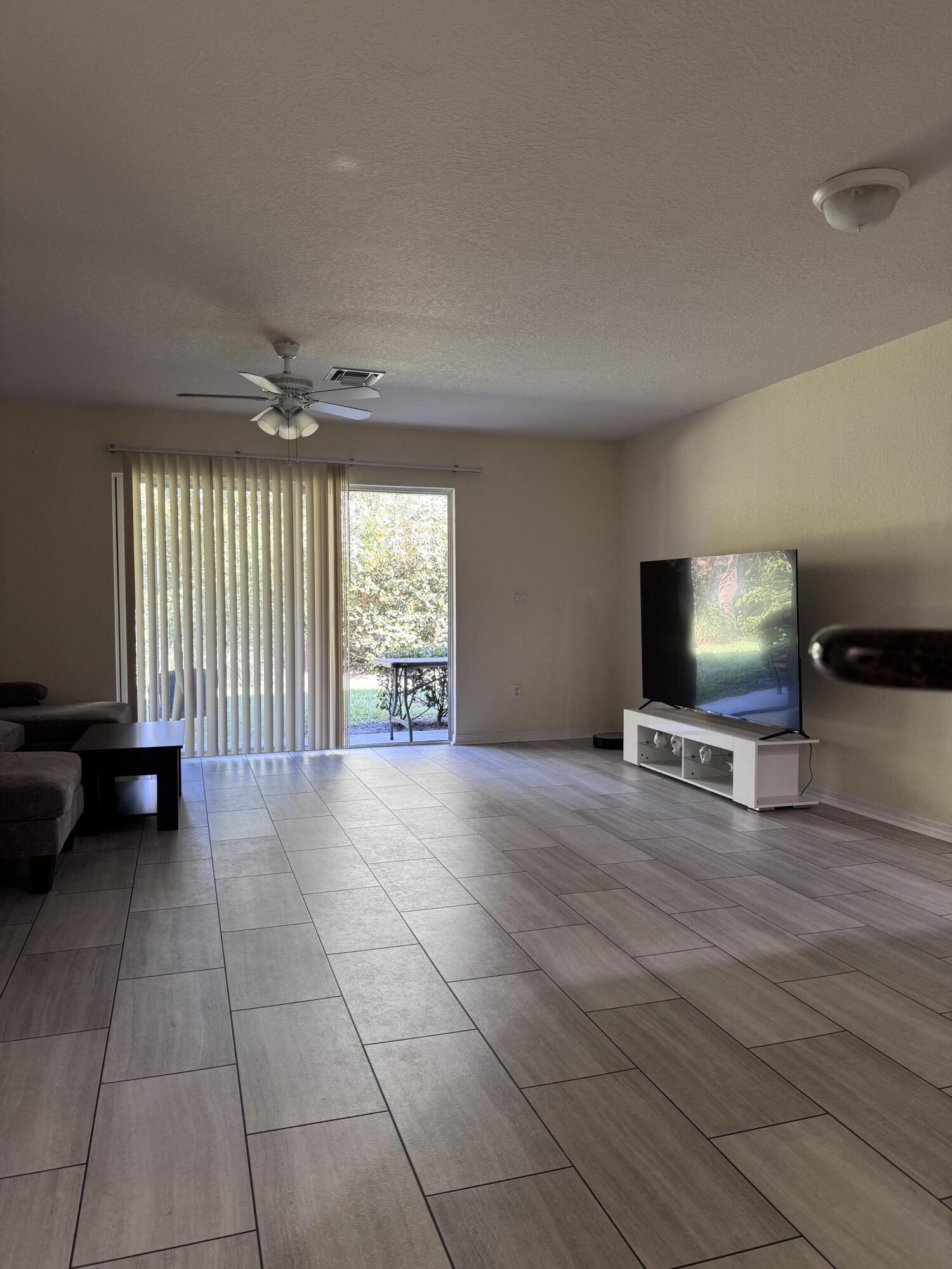 2755 Southeast Birmingham Drive, Unit 3 Stuart, FL 34994 - Photo 9 of 23 a view of an empty room with a window