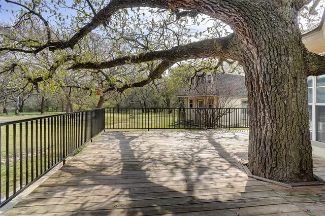 a view of pathway with a yard