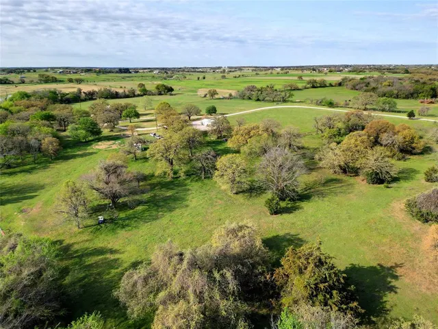 a view of a garden with an ocean