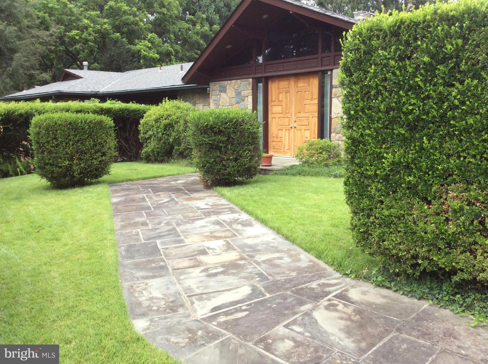 8501 Old Seven Locks Road Bethesda, MD 20817 - Photo 1 of 29 Front with flagstone walk