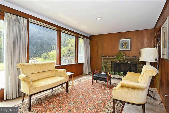 8501 Old Seven Locks Road Bethesda, MD 20817 - Photo 19 of 29 Lower Level Library with Fireplace