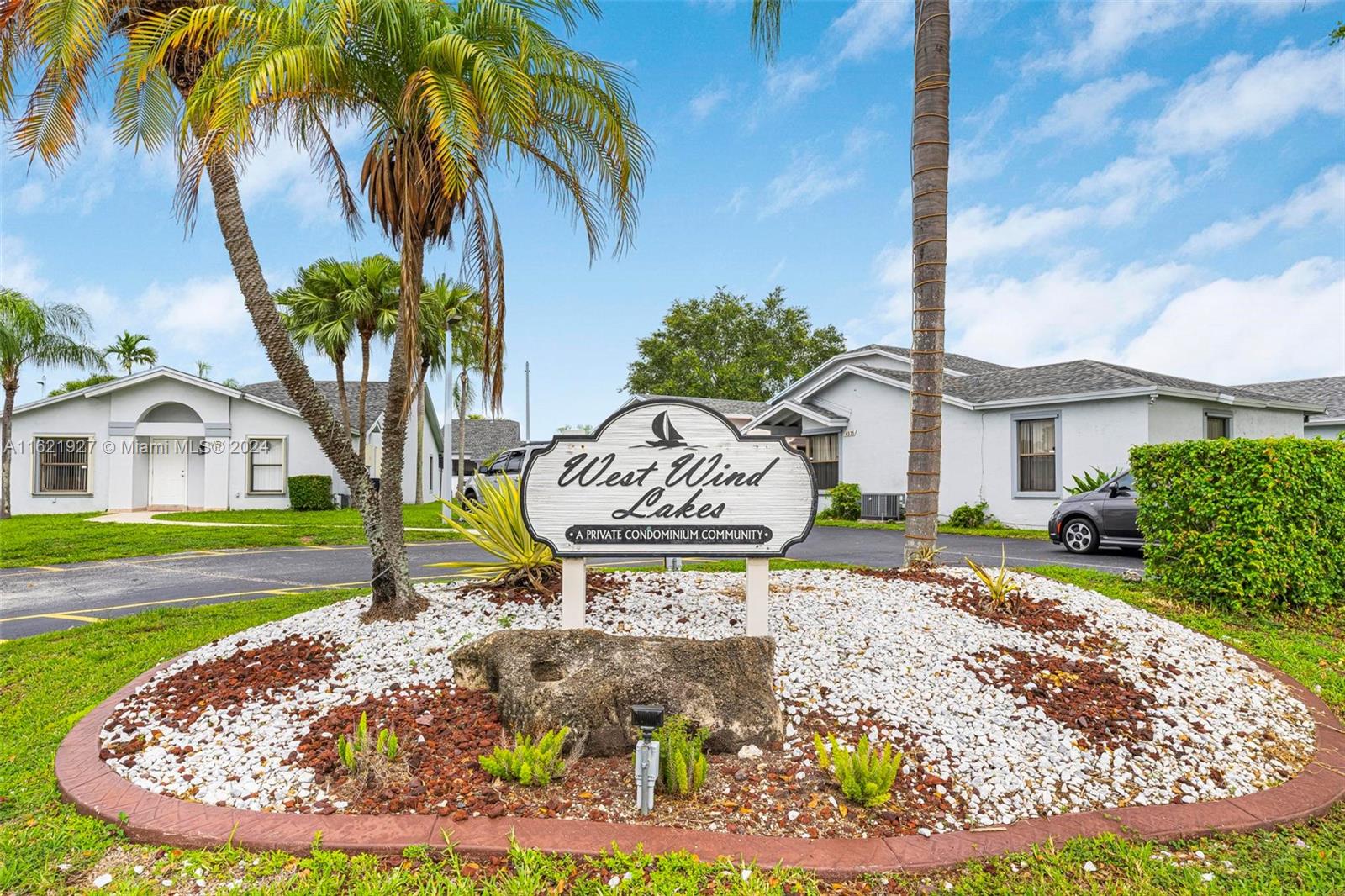 6604 Southwest 152nd Place, Unit 2604 Miami, FL 33193 - Photo 2 of 27 a view of a volley ball court